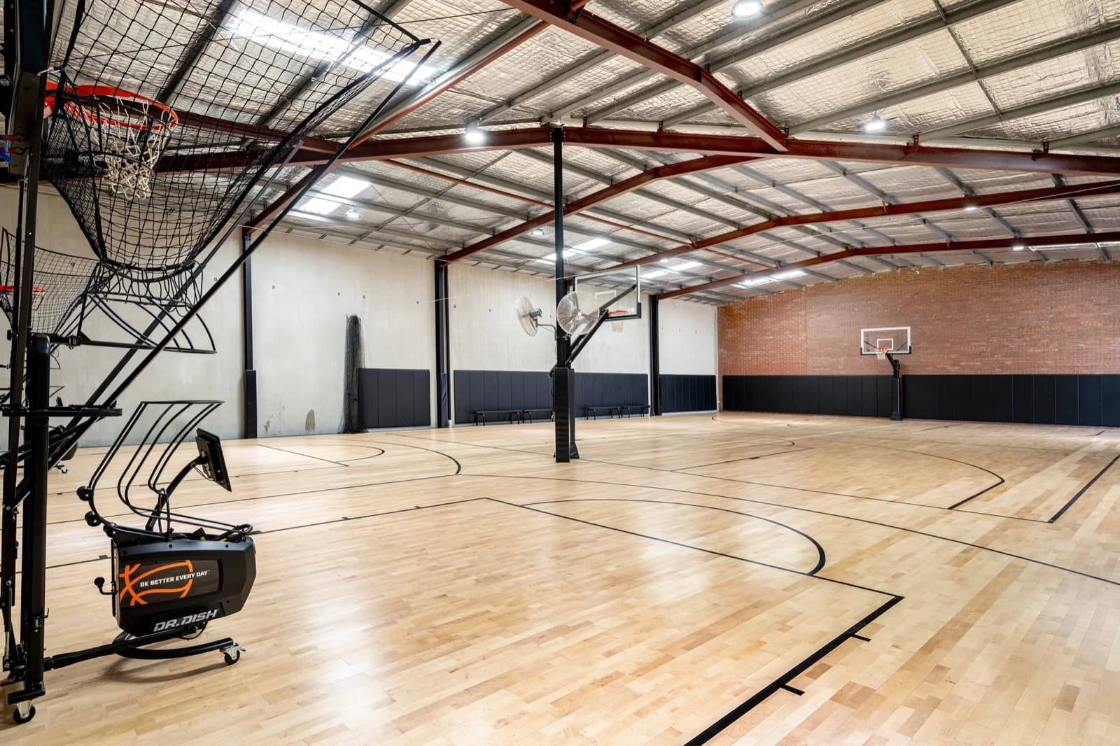 Dr. Dish shooting machine beside the maple court at CB24 Denning, Coastal Basketball's Bunbury centre