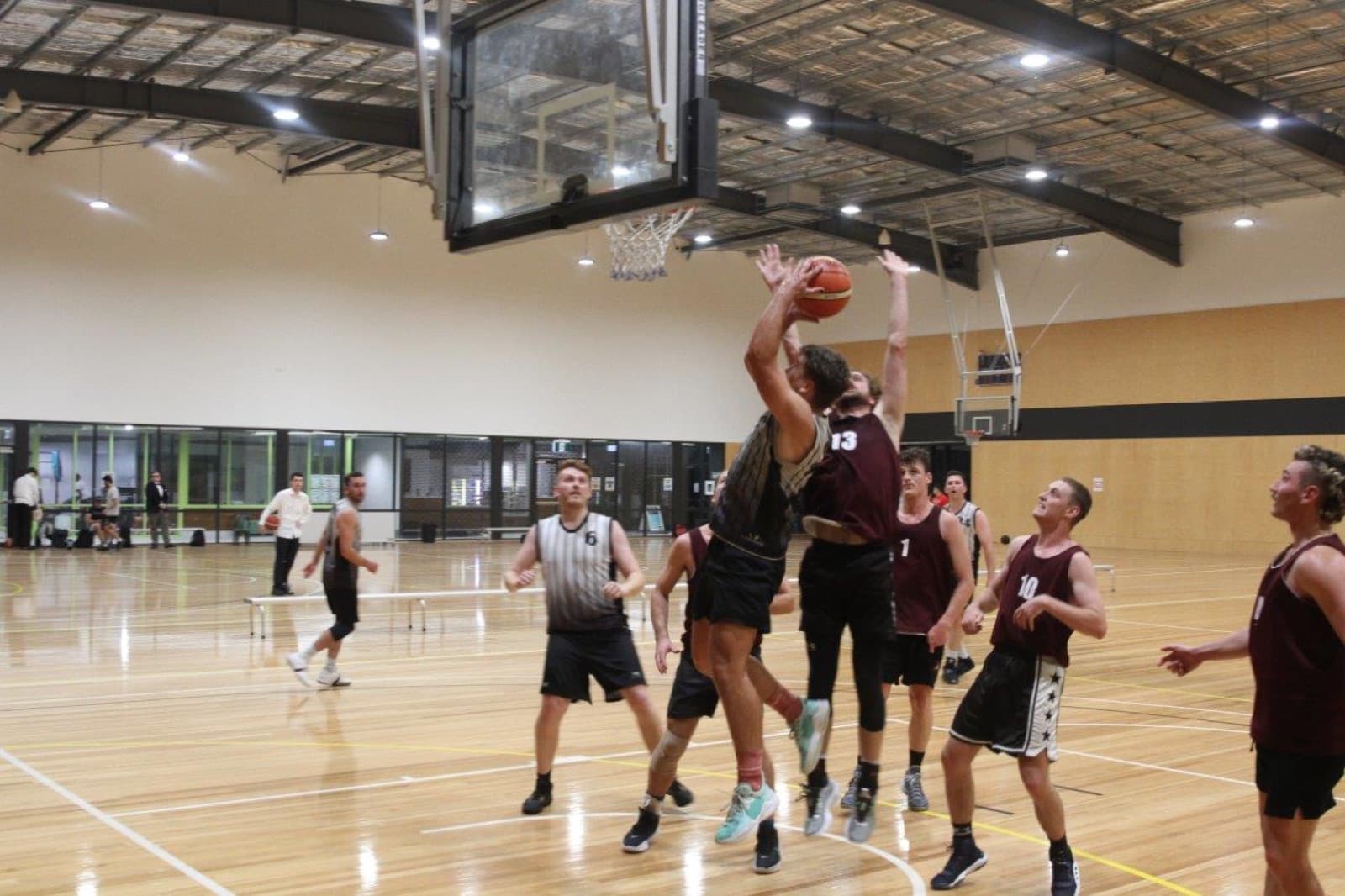 Senior domestic men's game at Collingwood Basketball Association, shot at the rim