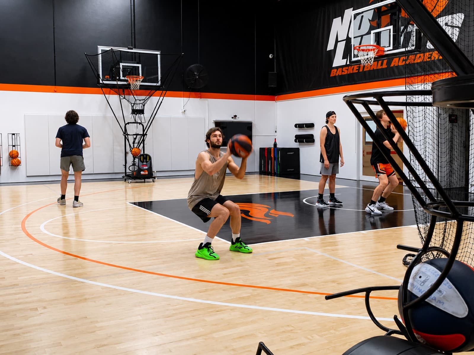 Players training on Dr. Dish shooting machines at The Lab, No Limits Basketball